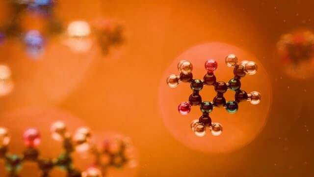 hydrogen640w Molecules in an orange image